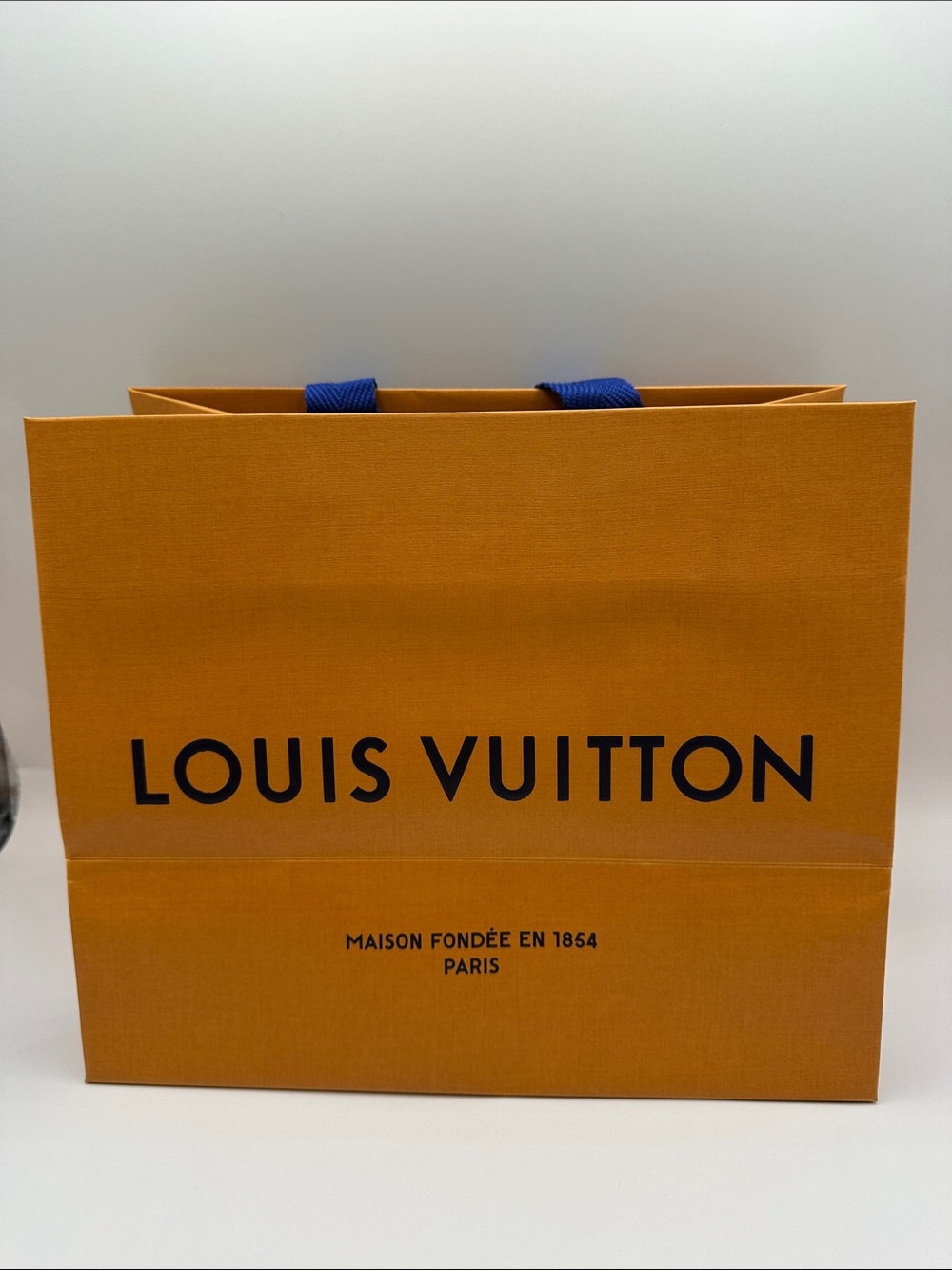 Louis Vuitton Orange Shopping Bag with Blue Handles
